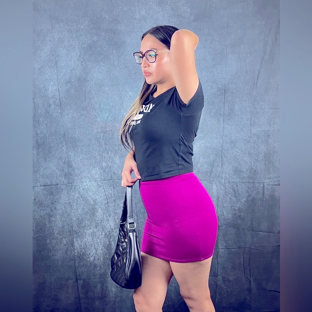 Beautiful soft stretchy magenta, mini skirt it never fit me. Never worn out
